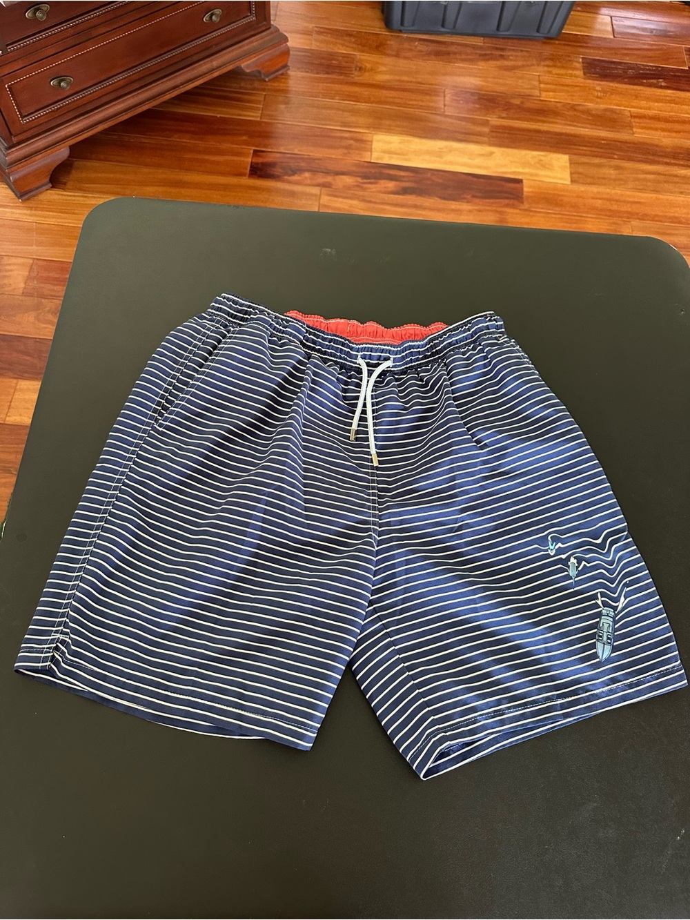 Peter Millar seaside collection swim trunks
Men's Navy Striped Swim Shorts Large
